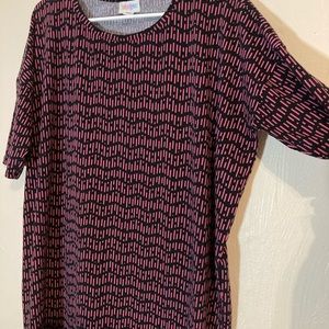 Longer pink and black shirt